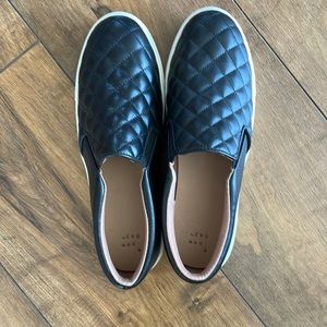 Women’s black slip on sneakers